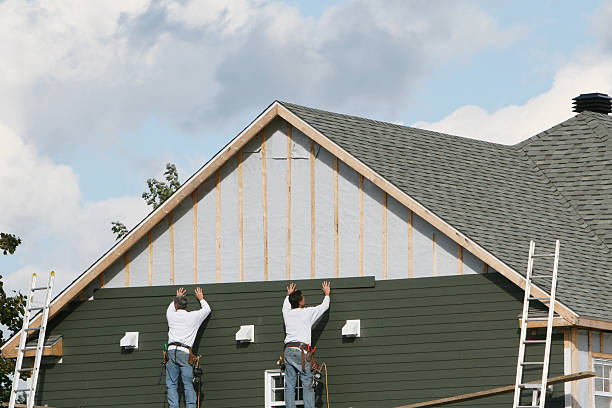 Professional Vinyl Siding technician working in Elrama, PA